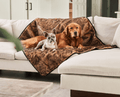 golden retriever dog and frenchie dog cuddling on short fur waterproof pet throw blanket